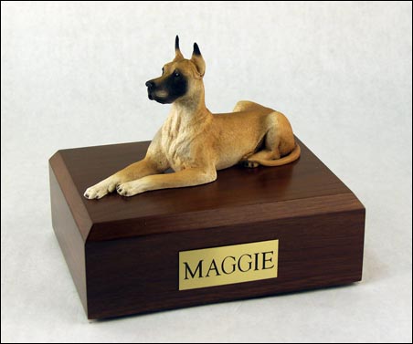 dog sculpture on wood cremation box