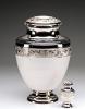 white and silver Cremation Urn