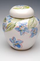 small ceramic urn with painted flowers