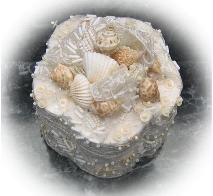 top of lace and sea shell wedding ring box