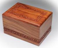 carved rosewood cremation urn