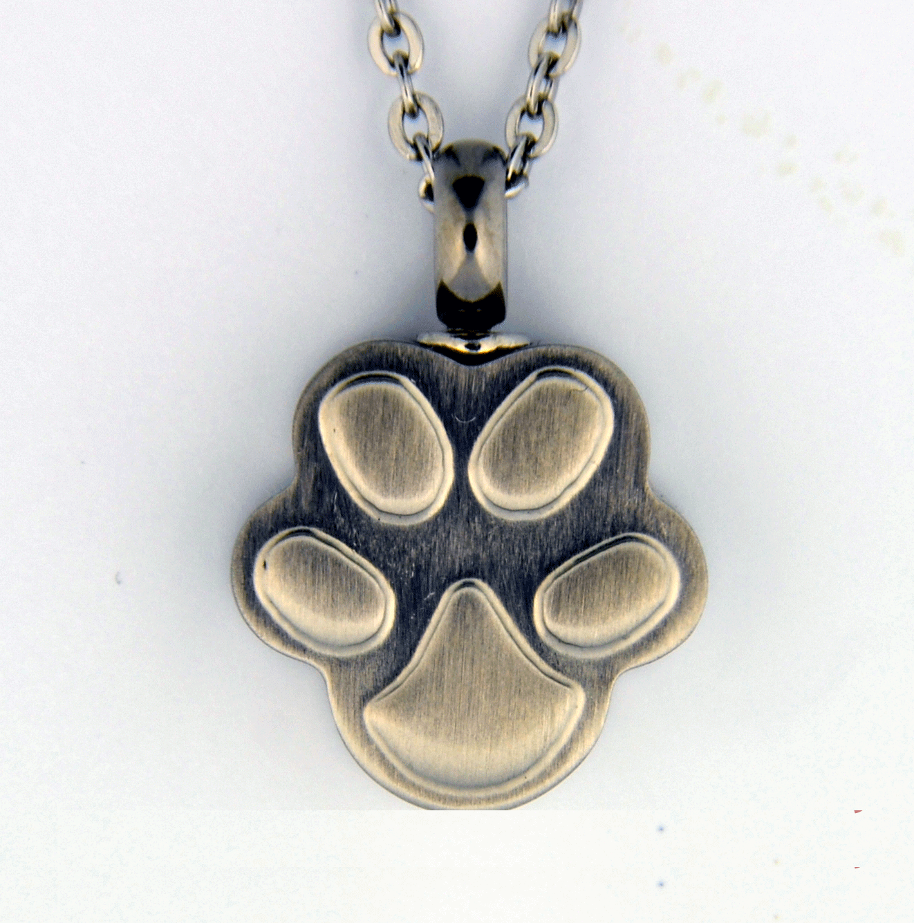 stainless steel paw print jewelry urn