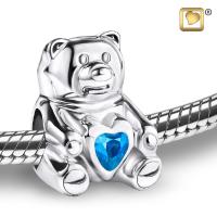 Teddy bear with blue stone