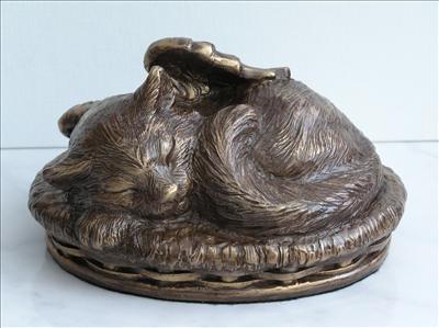 bronze cat angle in basket  urn