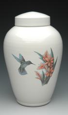 white ceramic hummingbird urn