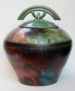 red raku orb urn