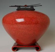 Red raku fired cremation urn