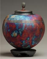 Round red blue and copper orb cremationurn urn
