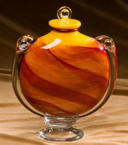 orange han blown glass cremation urn