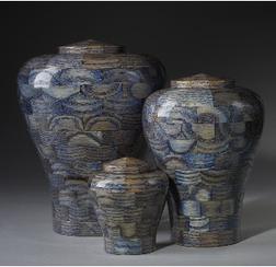 blue stained exotic wood urns