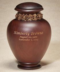wood urn with gold roses