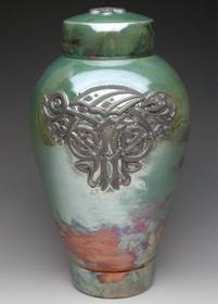 celic dragon raku urn in turkoise glase