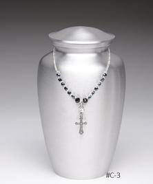 Silver urn with beaded Cross adornment