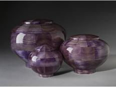 purple dyed wood cremation urns