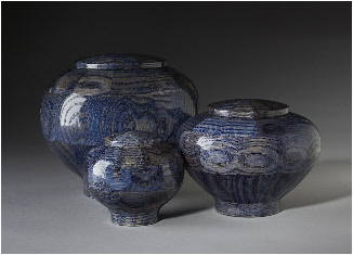 Wood cremation urns dyed blue