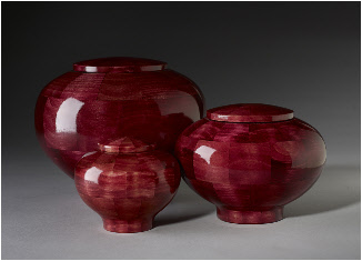 Red dyed wood cremation urns